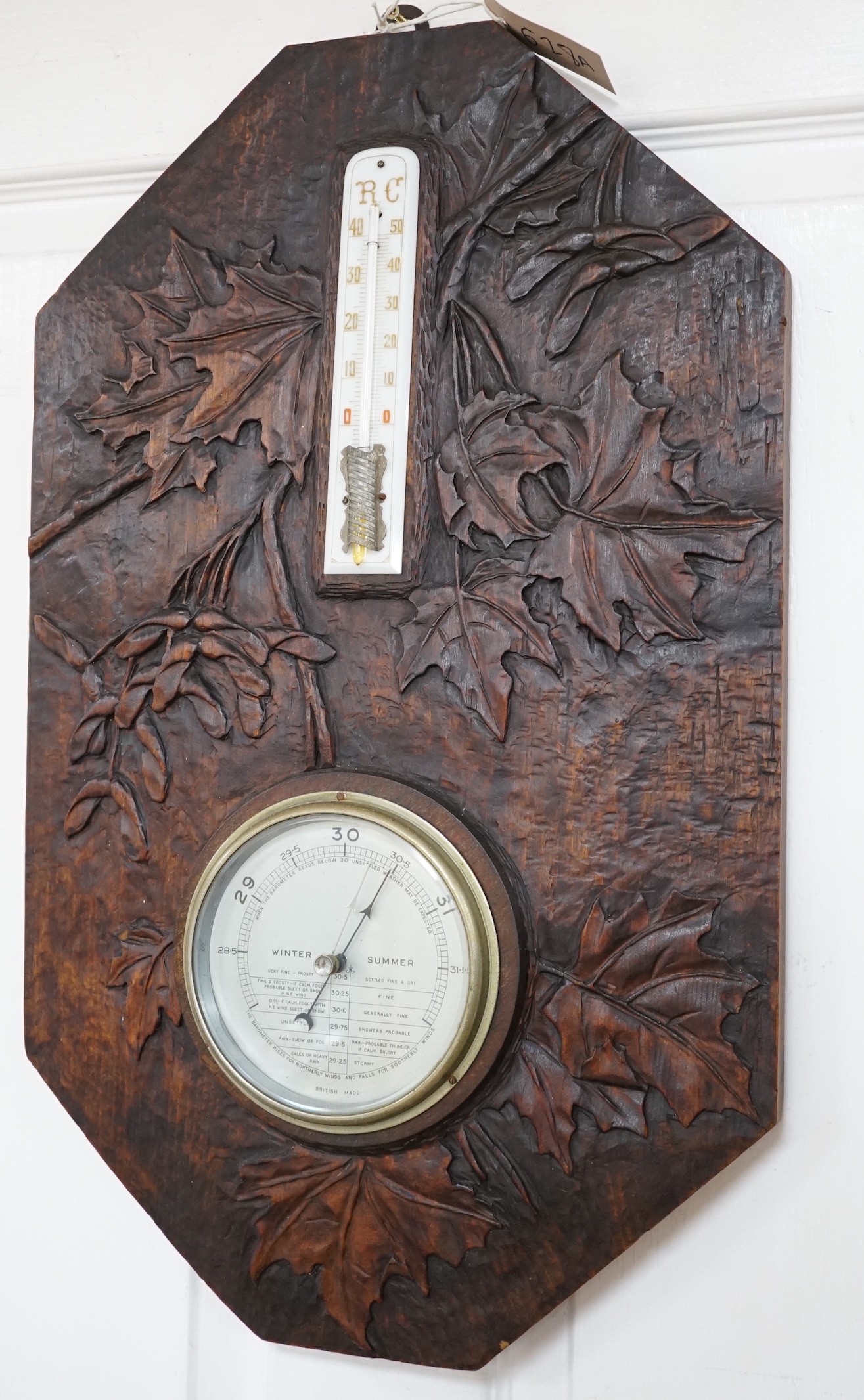 A French carved wood aneroid barometer, 60 x 36cm